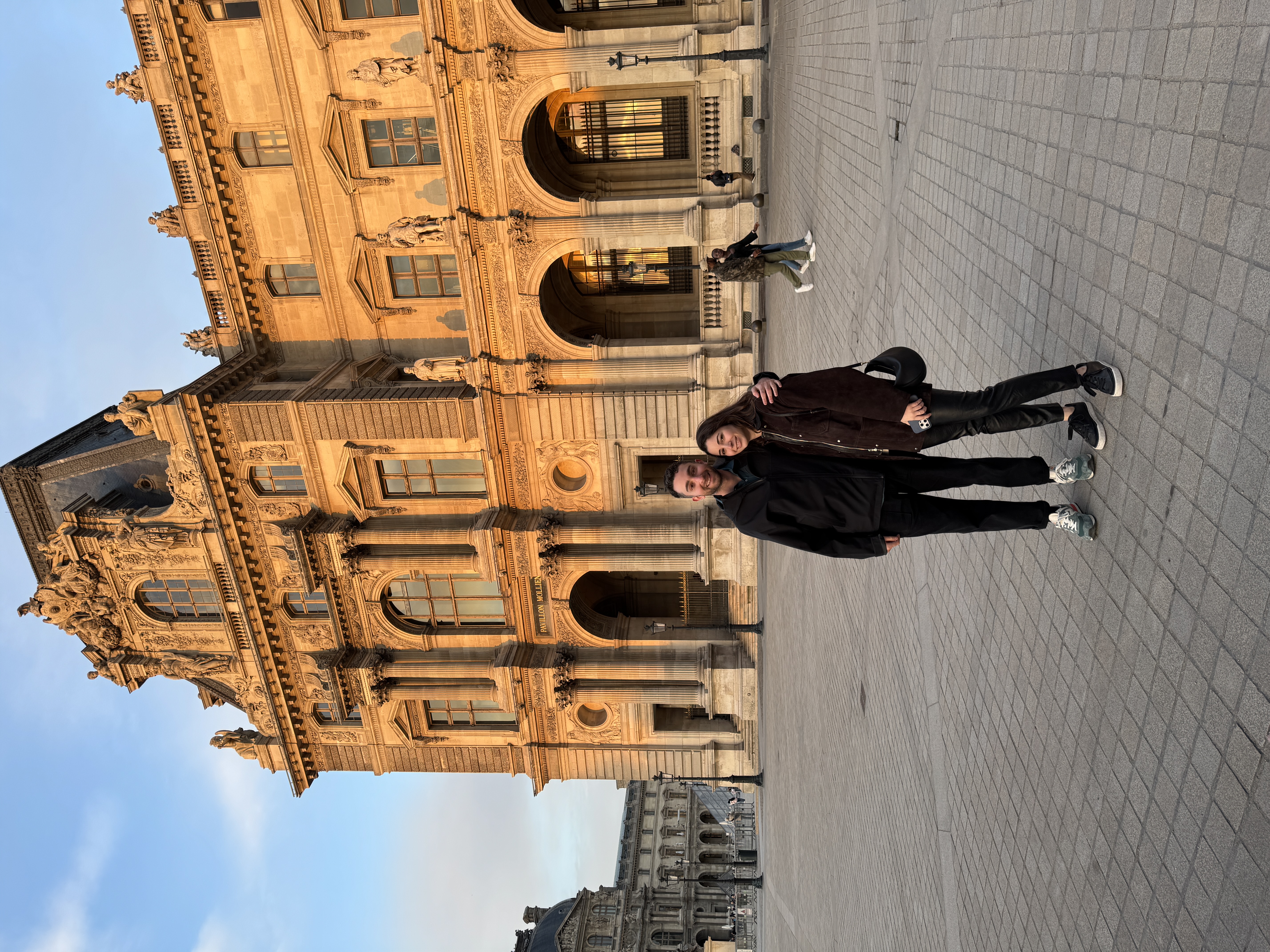 Jad and Reem at the Louvre at golden hour